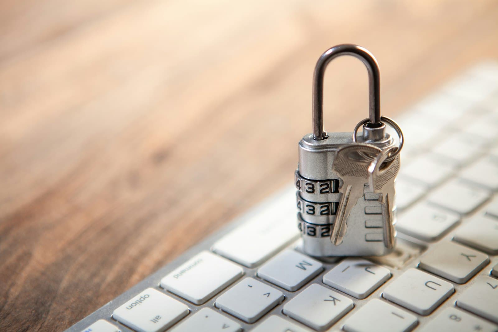 Padlock resting on a computer keyboard